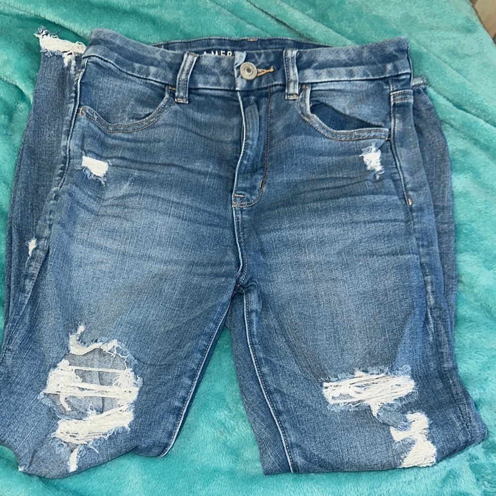 Distressed Blue Jeans by American Eagle
